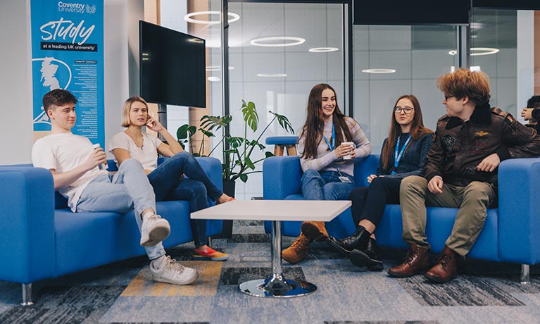 students sitting together in a common room