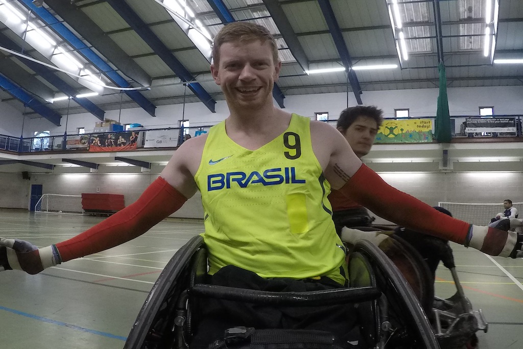 Jim Roberts smiling whilst playing wheelchair rugby