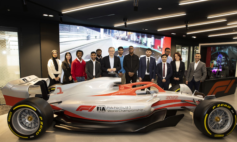 Muaaz Shah, fourth from the right, stood with fellow F1 scholars