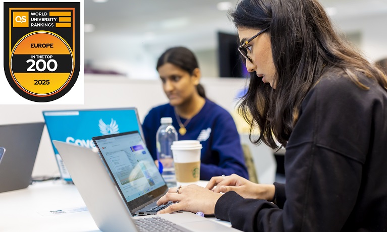 Students sitting at a desk using a laptop World University Rankings logo in top left hand corner - says in the Top