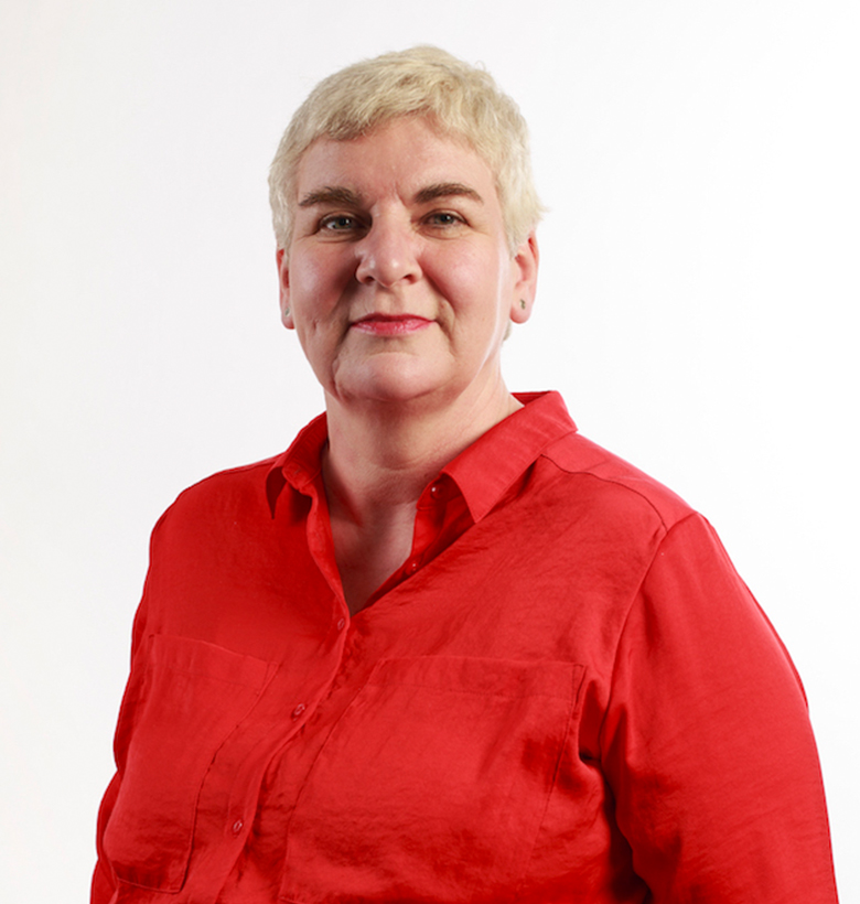 A portrait of Una Murphy wearing a red shirt with a white background